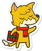 sticker of a friendly cartoon fox with christmas present png