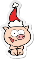 vrolijke zittende varken sticker cartoon van een dragende kerstmuts png