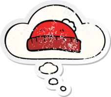 cartoon woolly hat and thought bubble as a distressed worn sticker png