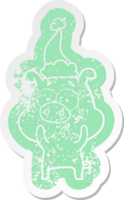 happy cartoon distressed sticker of a pig wearing santa hat png