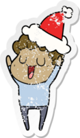 laughing hand drawn distressed sticker cartoon of a man wearing santa hat png