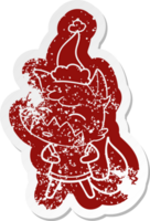 cartoon distressed sticker of a fox wearing santa hat png