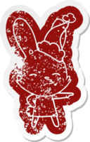 curious bunny quirky cartoon distressed sticker of a wearing santa hat png