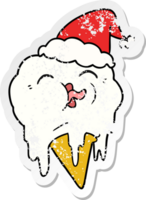 hand drawn distressed sticker cartoon of a melting ice cream wearing santa hat png