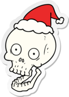 sticker cartoon of a skull wearing santa hat png