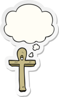 symbole ankh de dessin animé et bulle de pensée sous forme d'autocollant imprimé png