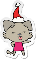 Hand gezeichnet Aufkleber Karikatur von ein Hund kleben aus Zunge tragen Santa Hut png