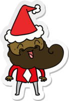 handgezeichneter aufkleberkarikatur eines glücklichen bärtigen mannes mit weihnachtsmütze png