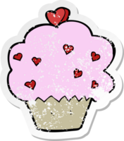 retro distressed sticker of a cartoon cupcake png