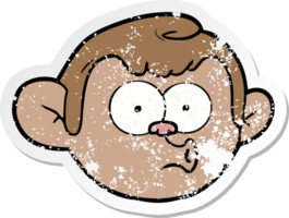 distressed sticker of a cartoon monkey face png