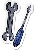 hand drawn distressed sticker cartoon doodle of a spanner and a screwdriver png