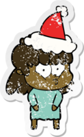 hand drawn distressed sticker cartoon of a whistling girl wearing santa hat png