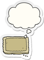 cartoon biscuit with thought bubble as a printed sticker png