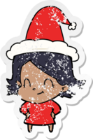 hand drawn distressed sticker cartoon of a friendly girl wearing santa hat png