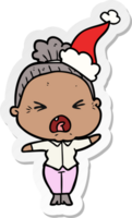 hand drawn sticker cartoon of a angry old woman wearing santa hat png