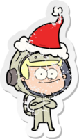 content astronaute main tiré affligé autocollant dessin animé de une portant Père Noël chapeau png