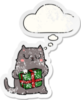 cartoon christmas cat and thought bubble as a distressed worn sticker png