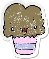 distressed sticker of a cartoon cupcake with face png