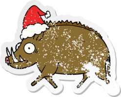 hand drawn distressed sticker cartoon of a wild boar wearing santa hat png
