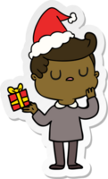 hand drawn sticker cartoon of a man wondering wearing santa hat png