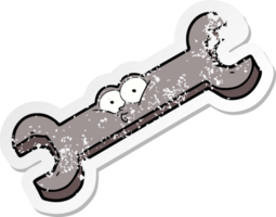 distressed sticker of a cartoon spanner png