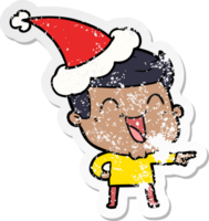 hand drawn distressed sticker cartoon of a man laughing wearing santa hat png