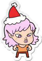 jolie main tiré autocollant dessin animé de une elfe fille portant Père Noël chapeau png