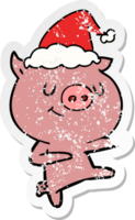 happy hand drawn distressed sticker cartoon of a pig dancing wearing santa hat png