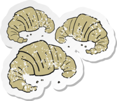 retro distressed sticker of a cartoon croissants png