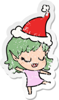 contento mano dibujado afligido pegatina dibujos animados de un duende niña vistiendo Papa Noel sombrero png