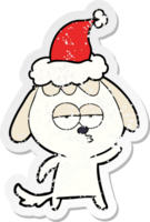 hand drawn distressed sticker cartoon of a bored dog wearing santa hat png