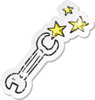 retro distressed sticker of a cartoon spanner png