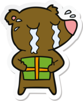 sticker of a cartoon crying bear with present png