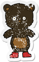 adesivo retrô angustiado de um filhote de urso preto de desenho animado png