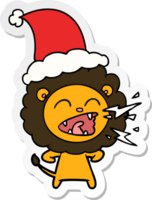 hand drawn sticker cartoon of a roaring lion wearing santa hat png