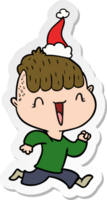 hand drawn sticker cartoon of a happy boy surprised wearing santa hat png