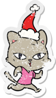 hand dragen bedrövad klistermärke tecknad serie av en katt ut för en springa bär santa hatt png