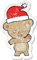 adesivo retrô angustiado de um ursinho de natal de desenho animado png