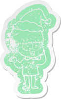 happy quirky cartoon distressed sticker of a boy wearing santa hat png