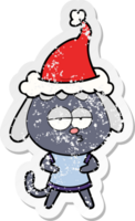 hand drawn distressed sticker cartoon of a bored dog wearing santa hat png