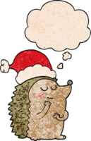 cartoon hedgehog wearing christmas hat with thought bubble in grunge texture style png