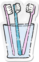 adesivo retrô angustiado de um copo de desenho animado e escovas de dentes png