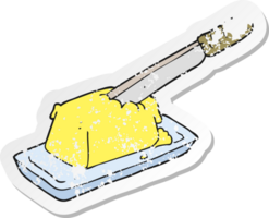 retro distressed sticker of a cartoon knife in butter png