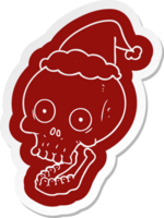 quirky cartoon  sticker of a skull wearing santa hat png