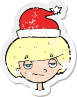 retro distressed sticker of a cartoon boy in santa hat png