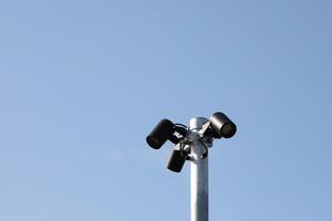 Round street light with clear blue sky background photo