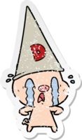 distressed sticker of a crying pig wearing dunce hat png