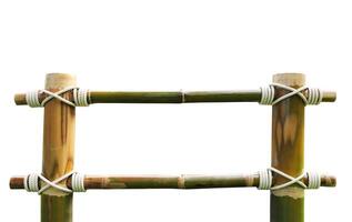 Bamboo frame tied with white rope on the corner isolated on white background photo