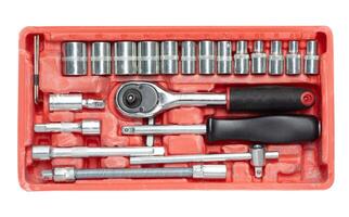 Set of mechanical tools in red plastic box. photo