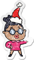 hand drawn distressed sticker cartoon of a pointing woman wearing spectacles wearing santa hat png